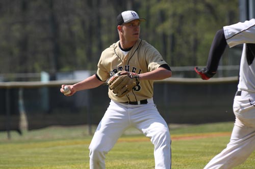 Bethel pitcher Blake Willis fields and throws out a Crichton Comet runner in game one of the series; Bethel swept Crichton.